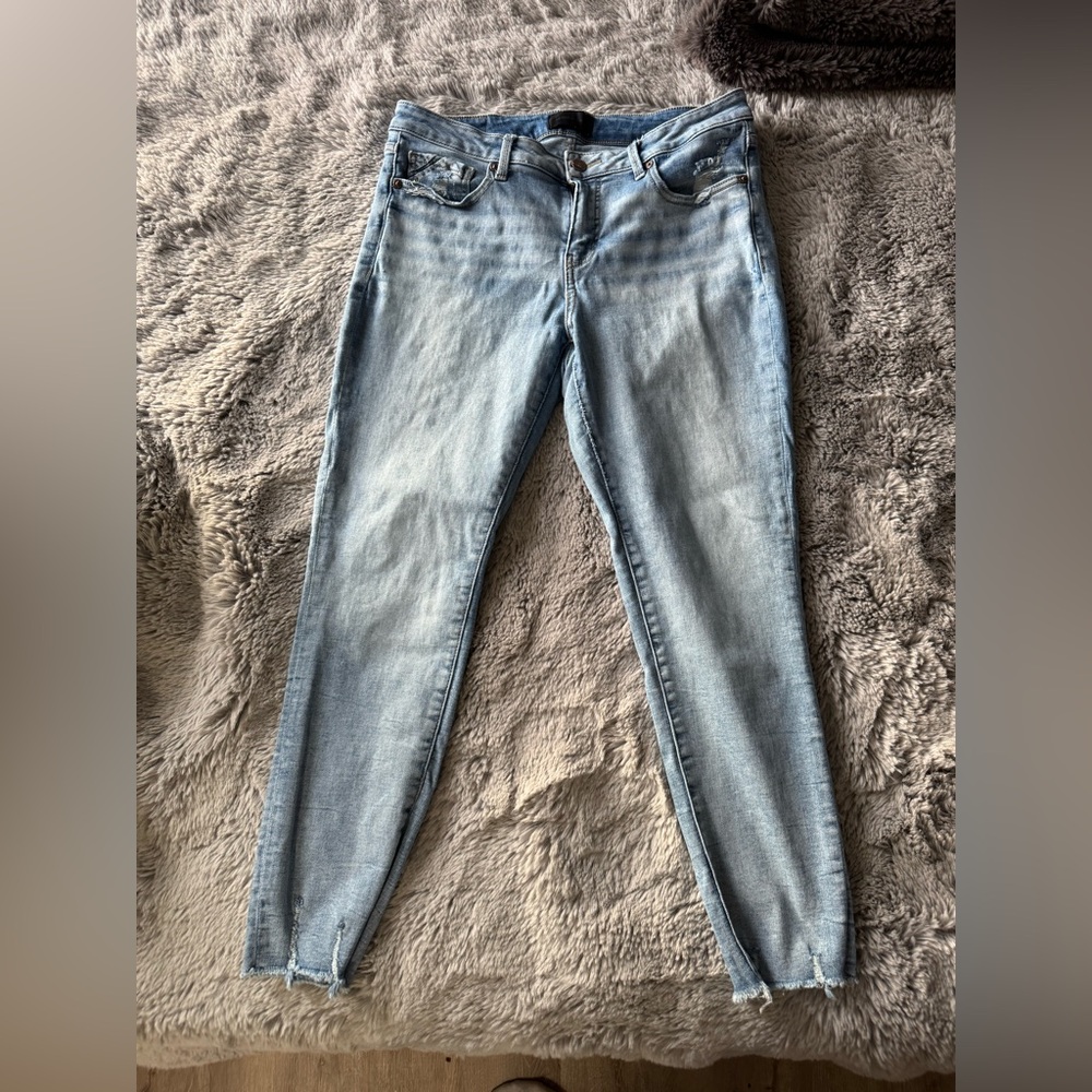 Buckle Black Light Wash Skinny Jeans